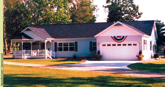 The porch and garage hide the fact that this is a straight ranch - Manufacturer: Manorwood