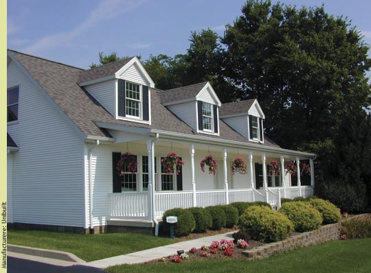 Dormers can add light to a Cape Cod's second story and interest to its roof line - Manufacturer: Unibuilt