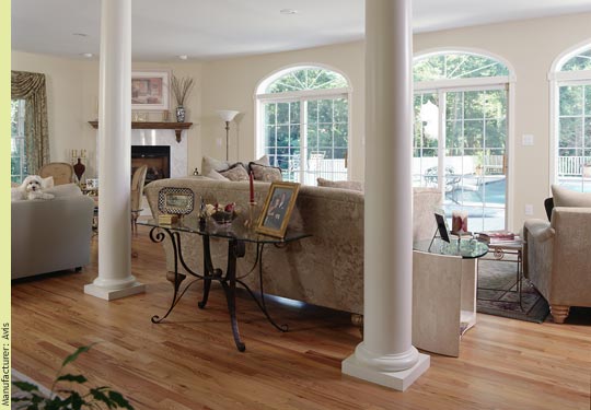 Classic Greek columns create a generous living room - Manufacturer:  Avis